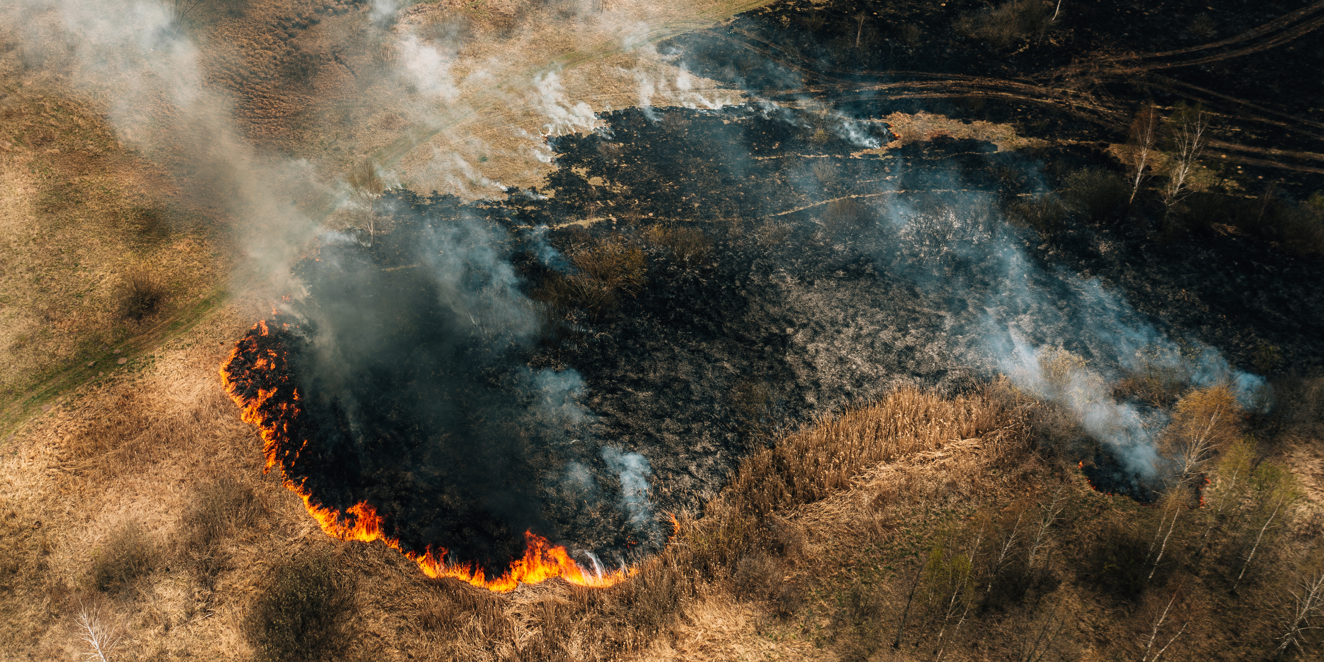 Aerial view of wildfire — the environments AT Labs hardware is built for